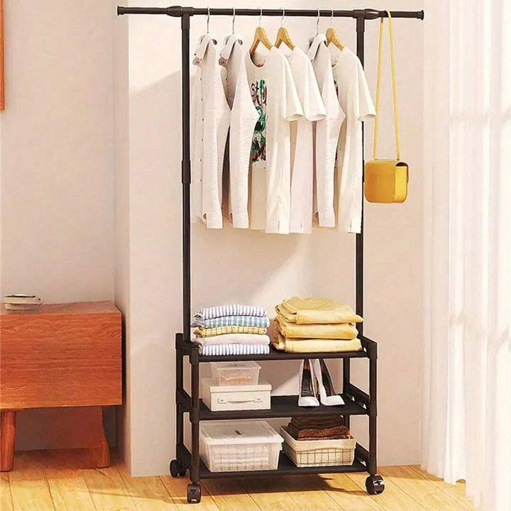 Multifunctional Clothes Organizer Rack with 3 Storage Racks, Top Hanging Rod and 4 Rotating Wheels